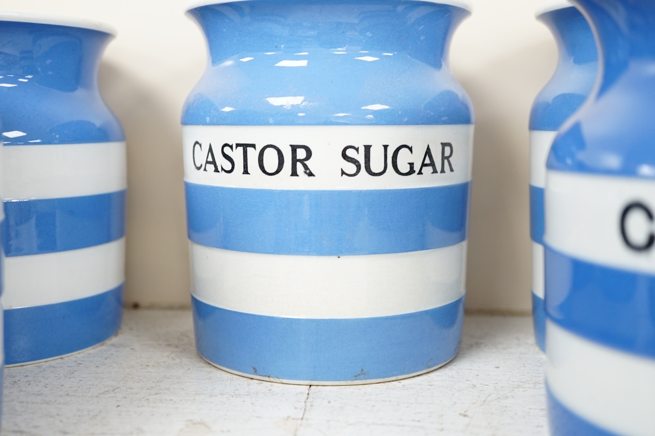 T.G.Green Cornish Kitchenware, nine 14cm lidded storage jars, comprising Pearl Barley, Coffee, Loaf Sugar, Figs, Apricots, Caster Sugar, Cocoa Nut, Coffee Sugar and Ground Rice, together with a 13.5cm Chocolate lidded st